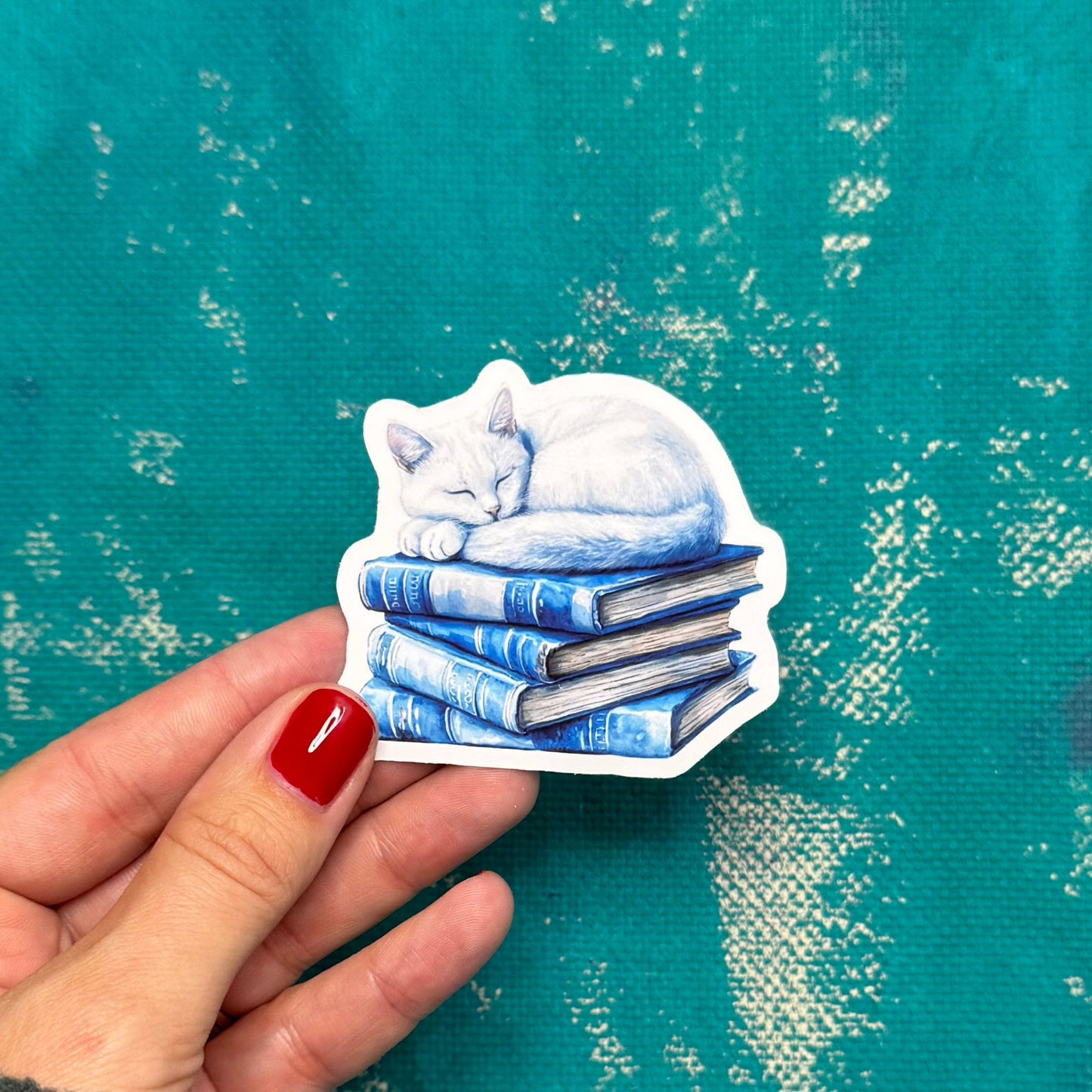 Vinylsticker Kitten en boeken