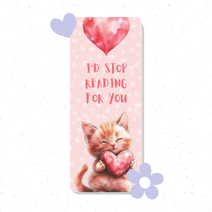 Bookmark with a cat holding a heart and text 'I'd stop reading for you' on a pink background.