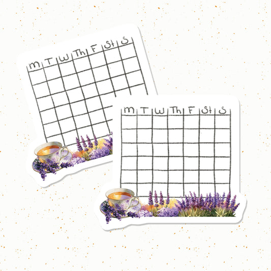 Two decorative planners with tea cup and lavender designs on a white background