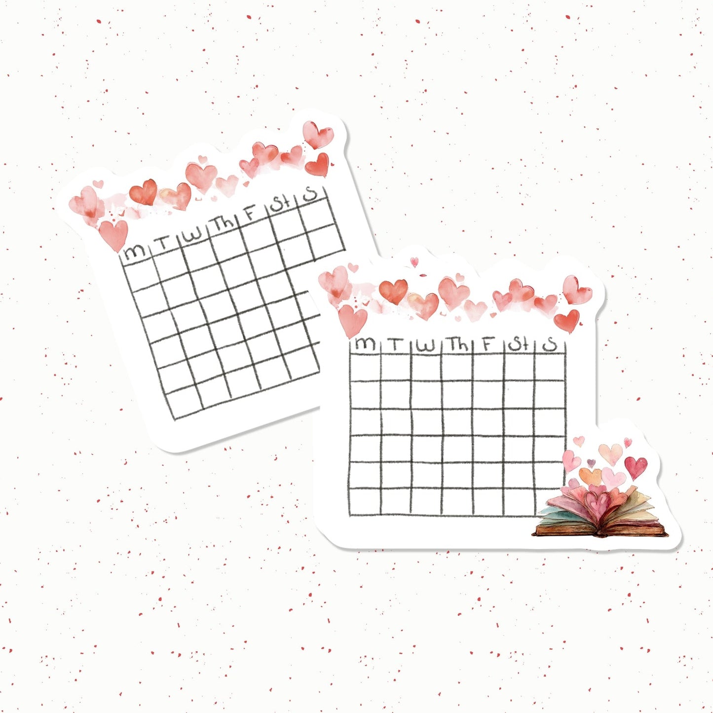 Two die-cut planner stickers with a weekly calendar grid, decorated with pink watercolor hearts and a small open book motif, shown on a white speckled background.