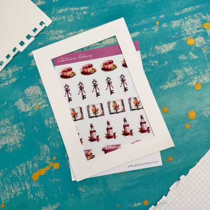 Sheet of decorative stickers on a textured blue surface