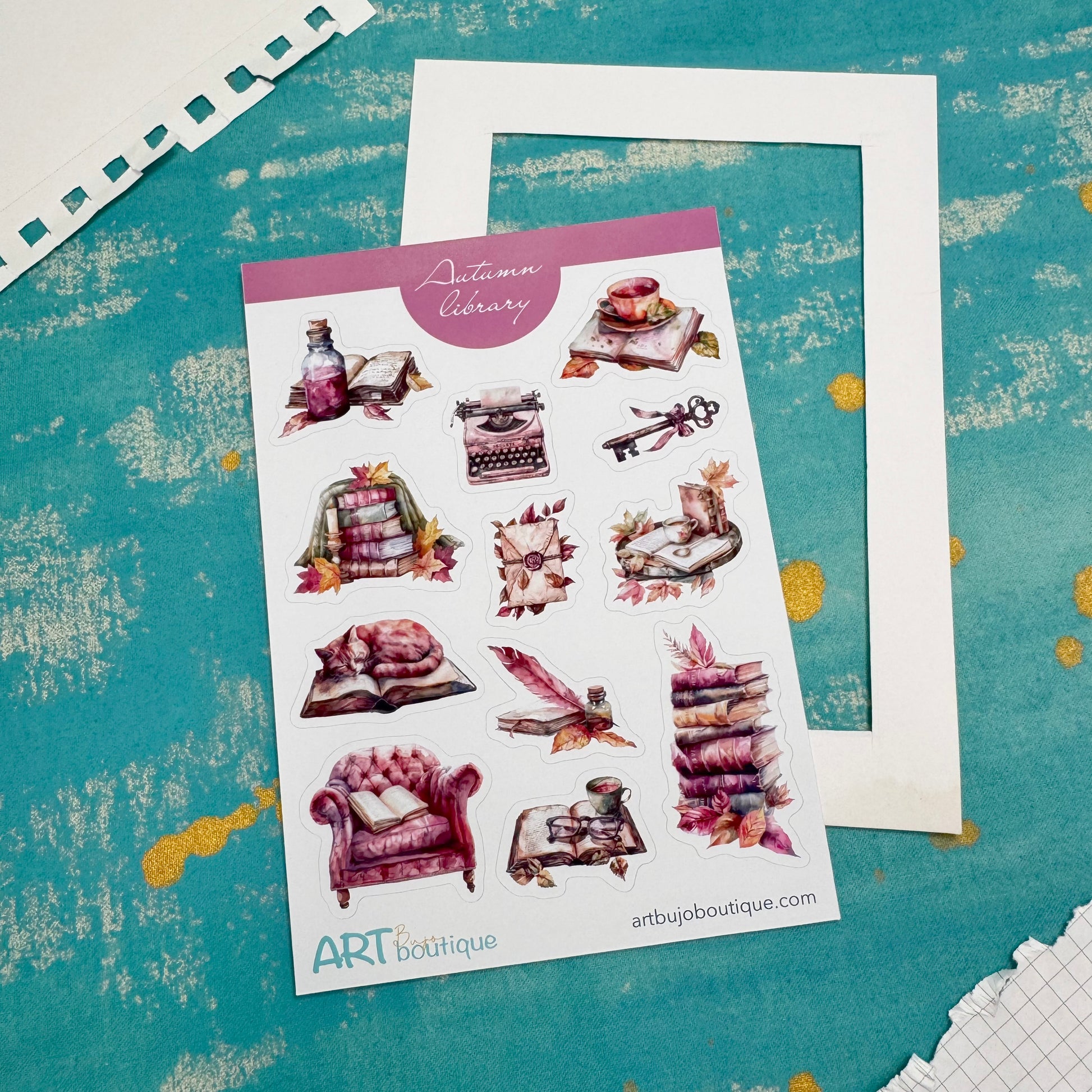 Sheet of decorative stickers with illustrations on a textured teal surface