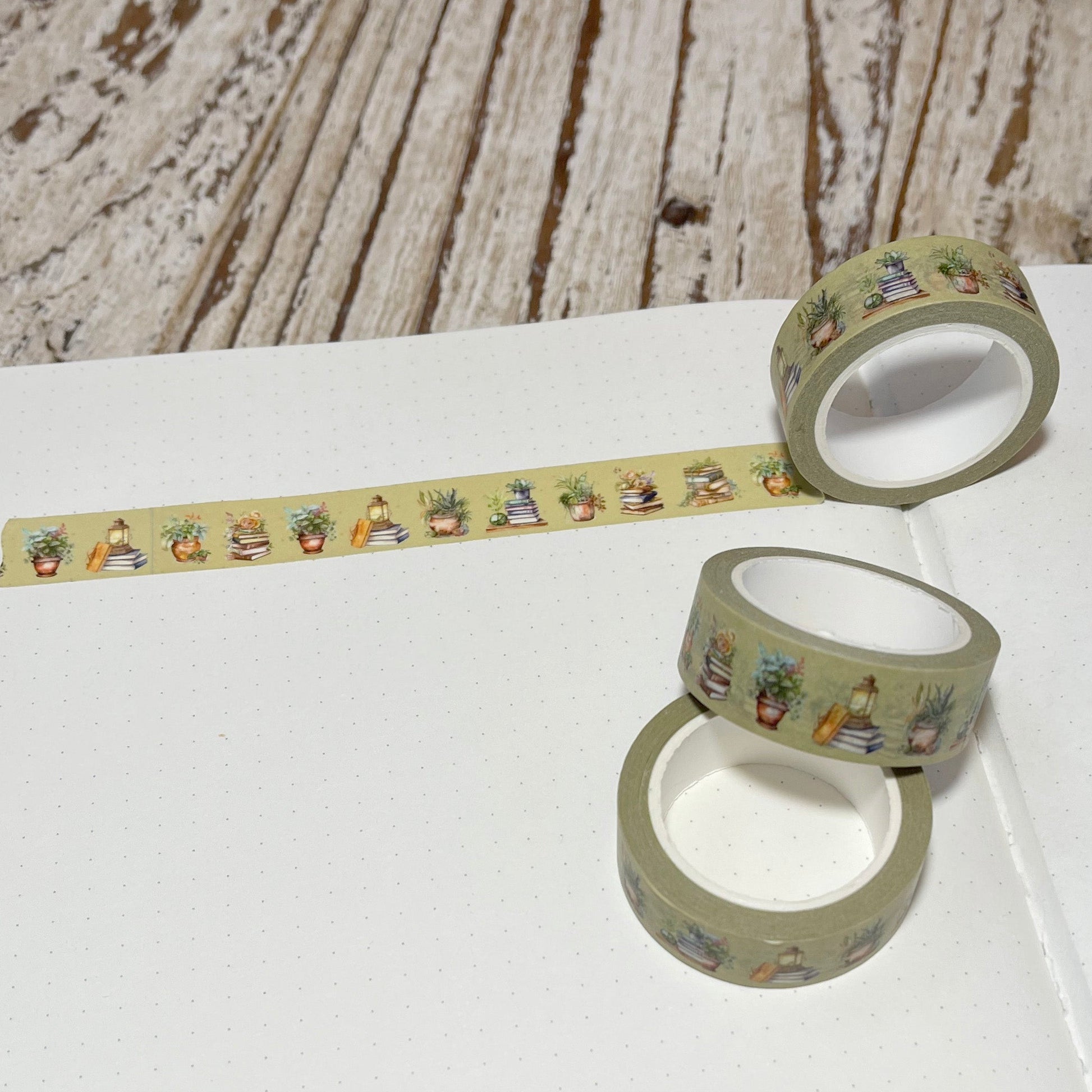 Green washi tape with books and plants design