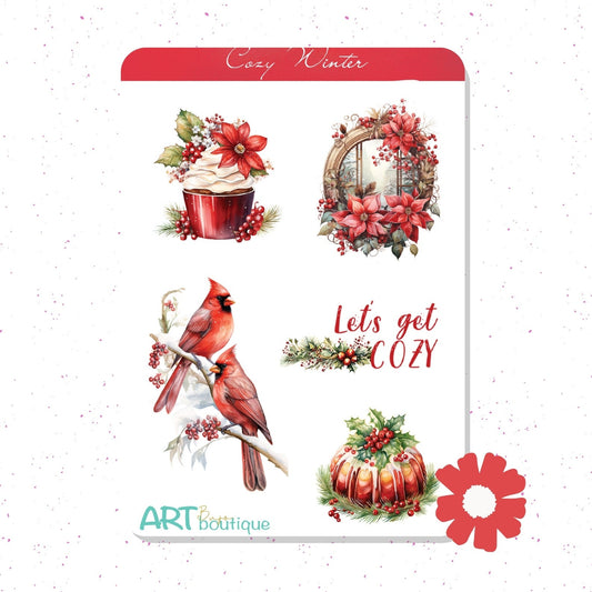 A sheet of watercolor-style holiday planner stickers or decals on a white background. The sheet has a red header reading 'Cozy Winter' and features illustrations of a red cupcake with flowers, a floral wreath, two red cardinals on branches, the phrase 'Let's get COZY' in red script, and a red-and-green pumpkin.
