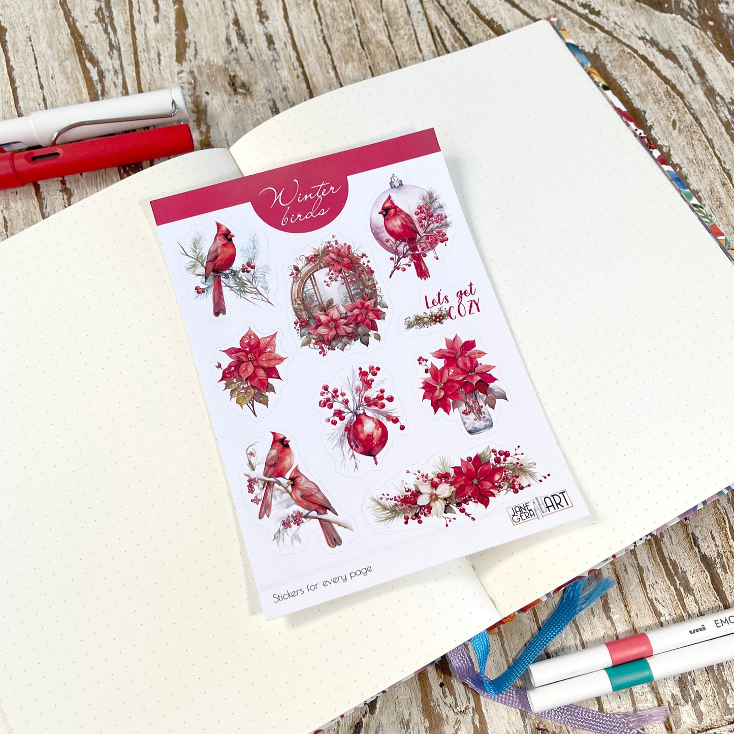 stickers with red cardinal birds. and red flowers