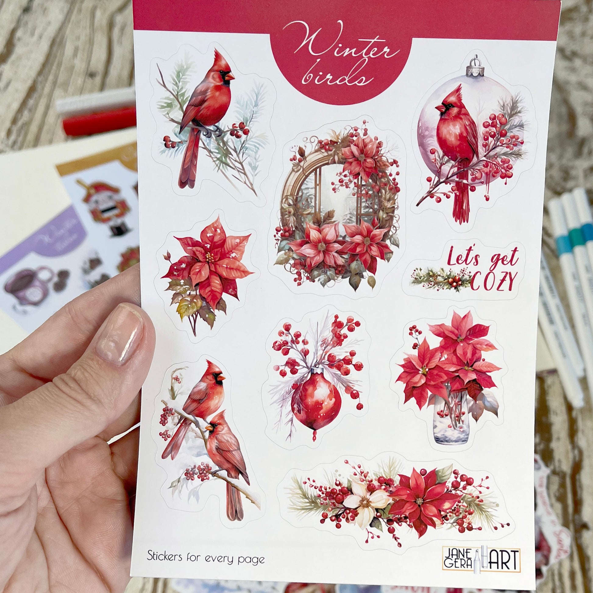 stickers with red cardinal birds. and red flowers